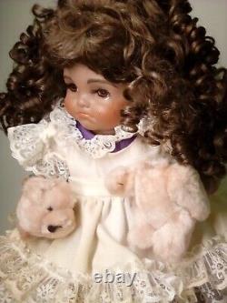 18 Porcelain African American Doll with broken puppy. Roman c502