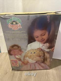 1986 Official Cabbage Patch Kids AA Doll, Purple Dress WithHairbrush & Birth Cert