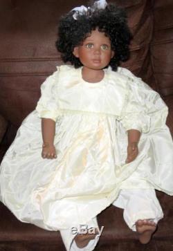 31 Christine Orange African American Hard Vinyl Doll