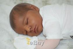 AA ethnic reborn baby cloth body ooak doll. Extremely poseable