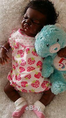 A/A African American newborn dark skintone sleeping reborn doll