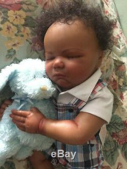African American/bi-racial reborn boy doll 20 hand rooted hair, full arms, legs