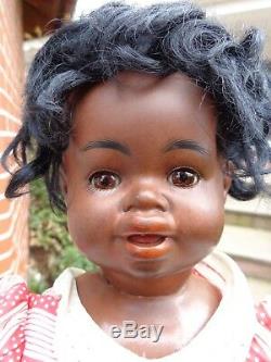 Antique doll black doll mulatto doll brown bisque