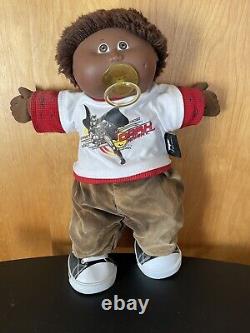 Cabbage Patch Kids'85 African American Boy Pacifier Doll wearing Batman Shirt