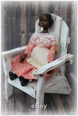Hand carved wooden African American hitty doll