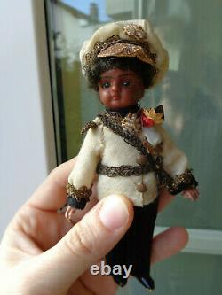 Rare antique mignonette doll with original clothes
