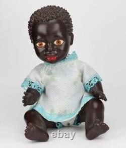 Vintage Poland African-American plastic doll signed PEW